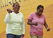 Two black women walking for exercise