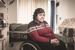 senior disabled hispanic woman in wheelchair